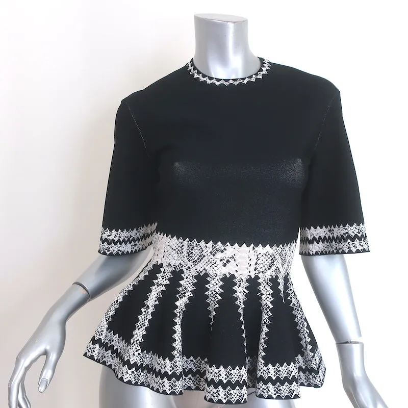 Alexander McQueen Haut à péplum en jacquard imprimé serpent noir Taille S