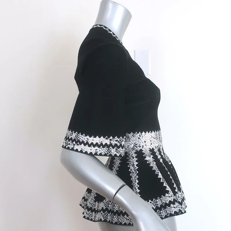 Alexander McQueen Haut à péplum en jacquard imprimé serpent noir Taille S
