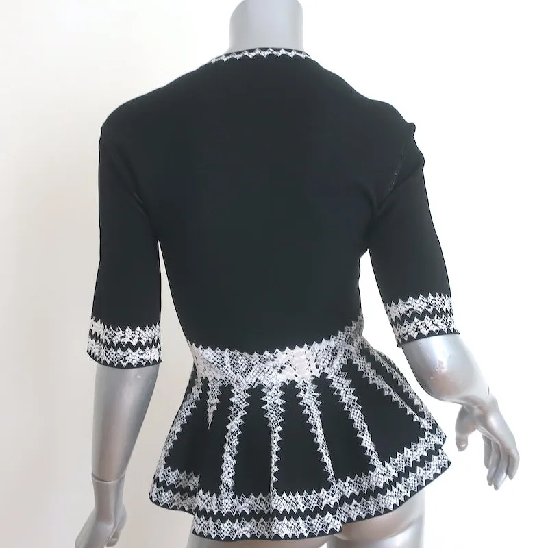 Alexander McQueen Haut à péplum en jacquard imprimé serpent noir Taille S