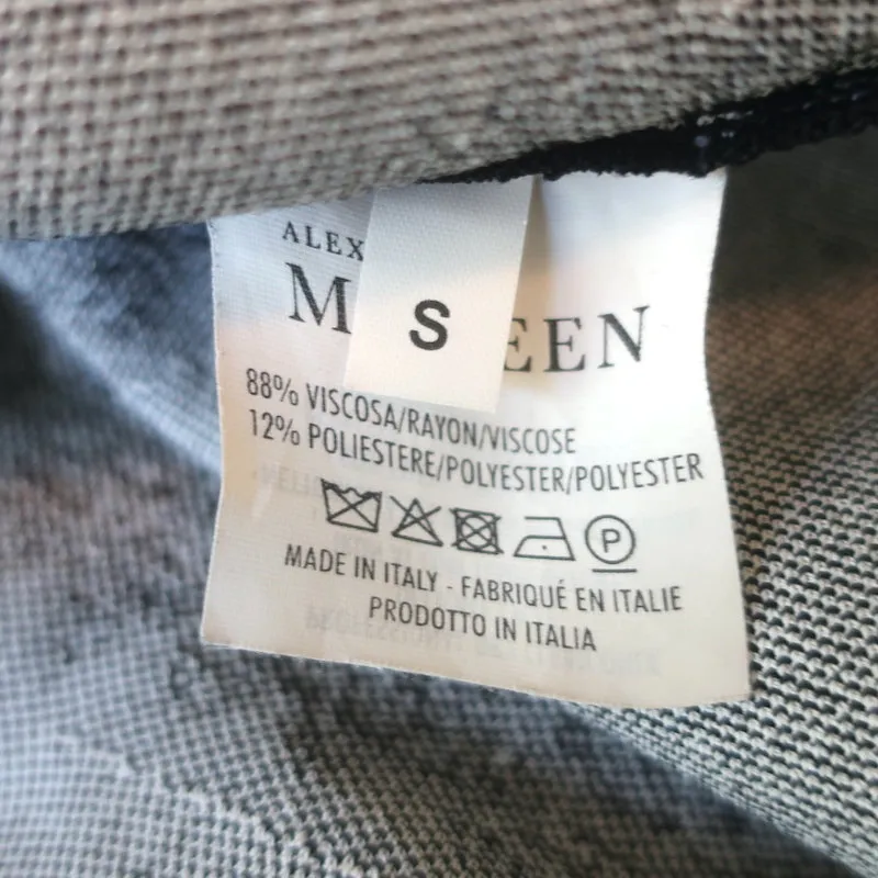 Alexander McQueen Haut à péplum en jacquard imprimé serpent noir Taille S