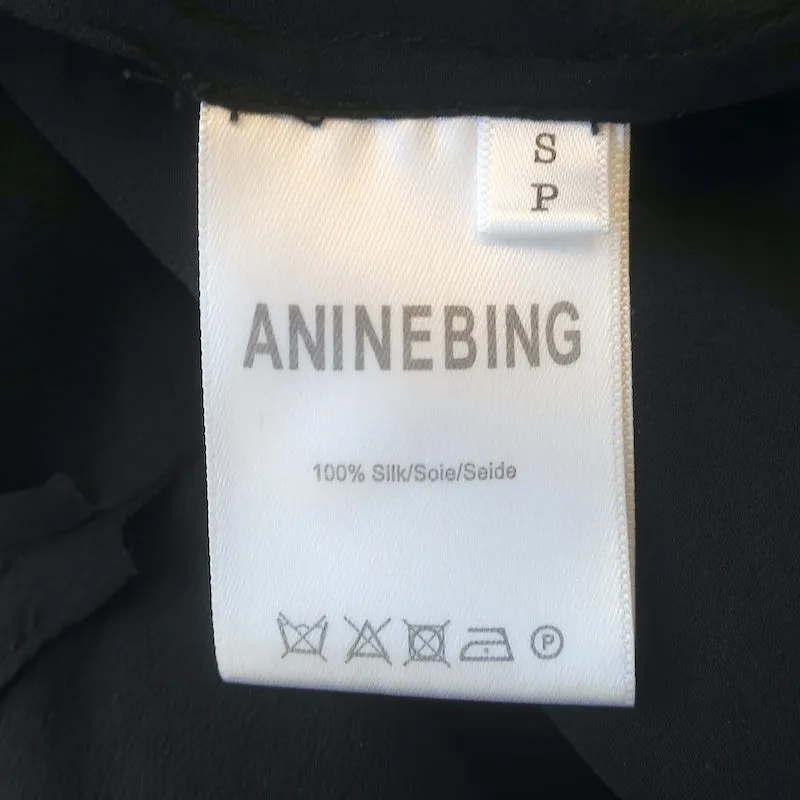 ANINE BING Débardeur en Soie Noire à Encadrement Dentelle Taille Petite Décolleté en V