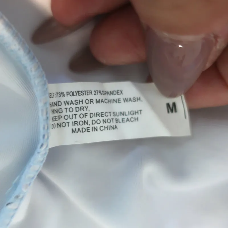 Cynthia Rowley Haut anti-UV imprimé papillon bleu taille moyenne
