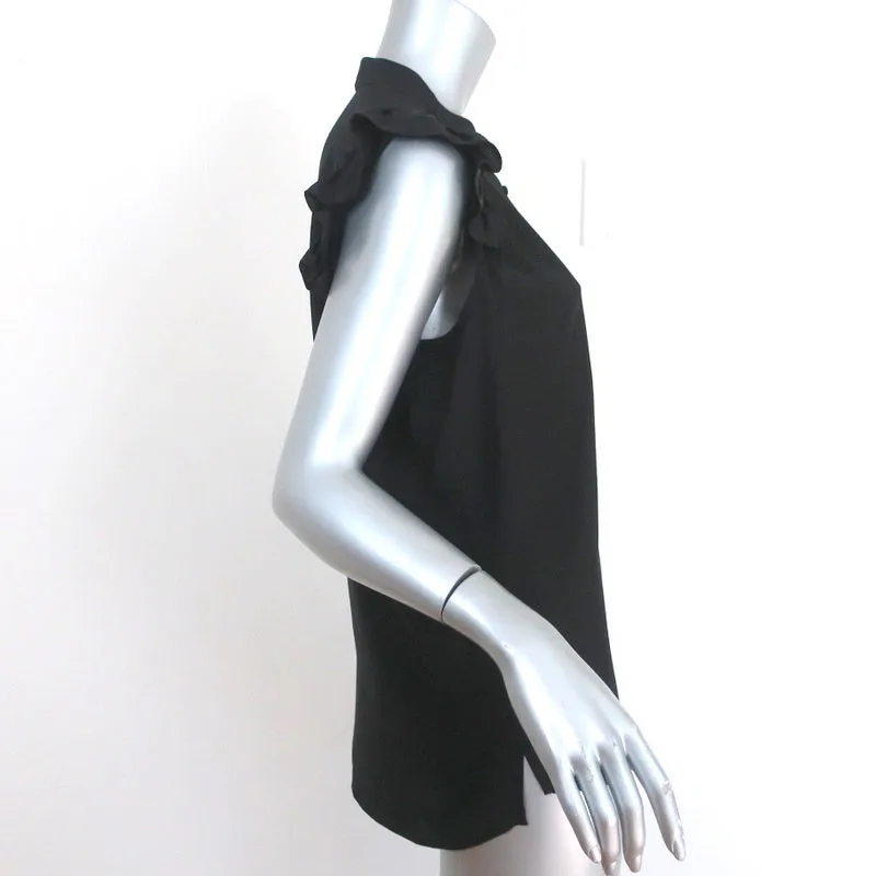 Haut à manches à volants encadrées en soie noire taille petit blouse à demi-boutonnage
