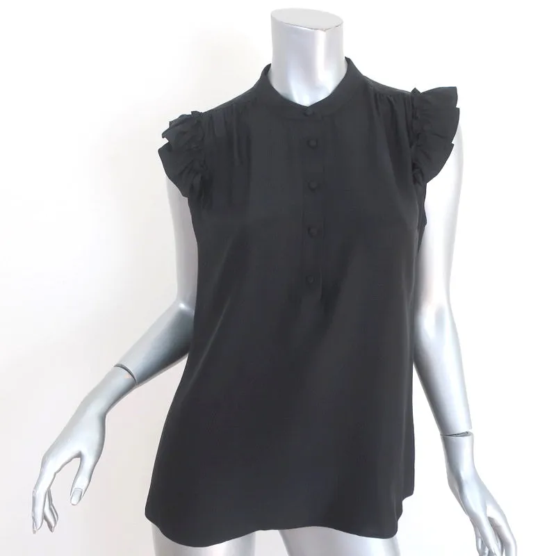 Haut à manches à volants encadrées en soie noire taille petit blouse à demi-boutonnage