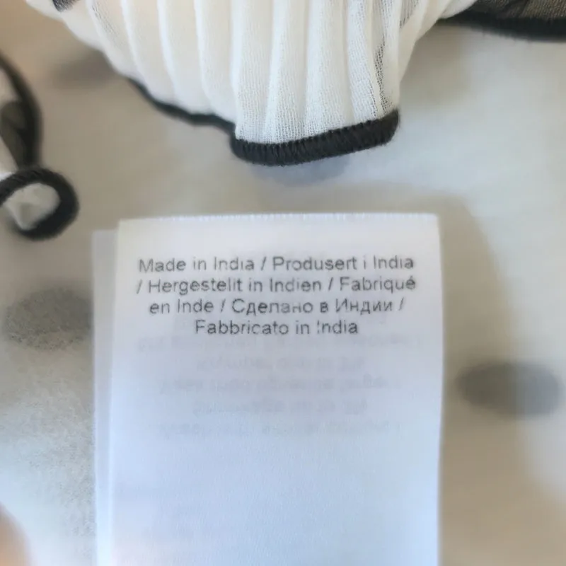GANNI Haut à pois blanc/noir en georgette plissée taille 36 blouse à manches volantes