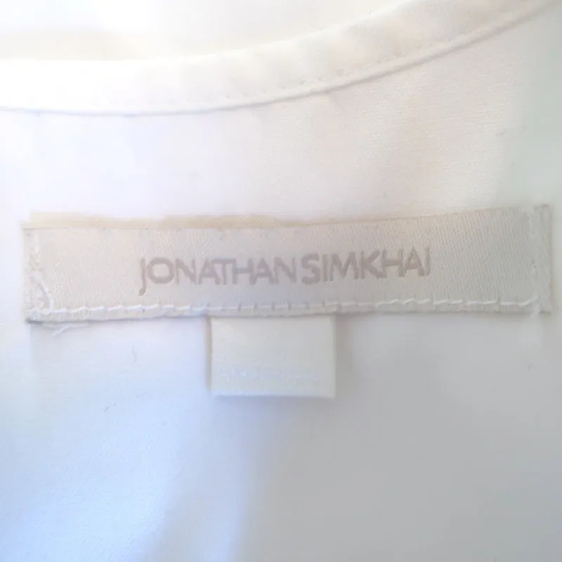 Jonathan Simkhai Haut à volants orné de fausses perles en coton blanc Taille S
