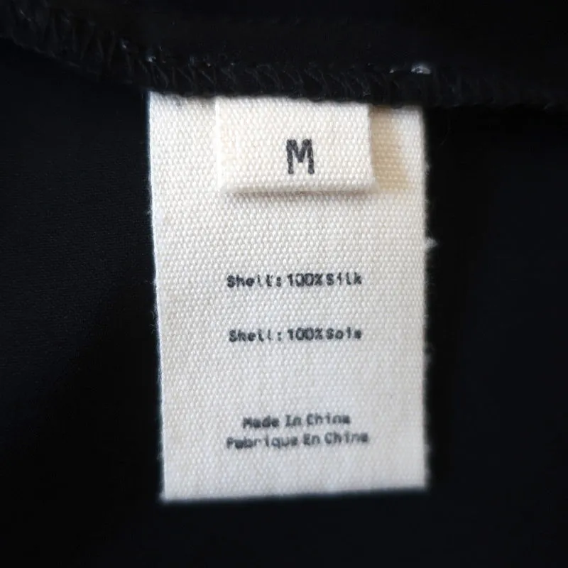 L'Agence Ruffle Blouse Lisette Top Sans Manches en Soie Noire Taille Moyenne