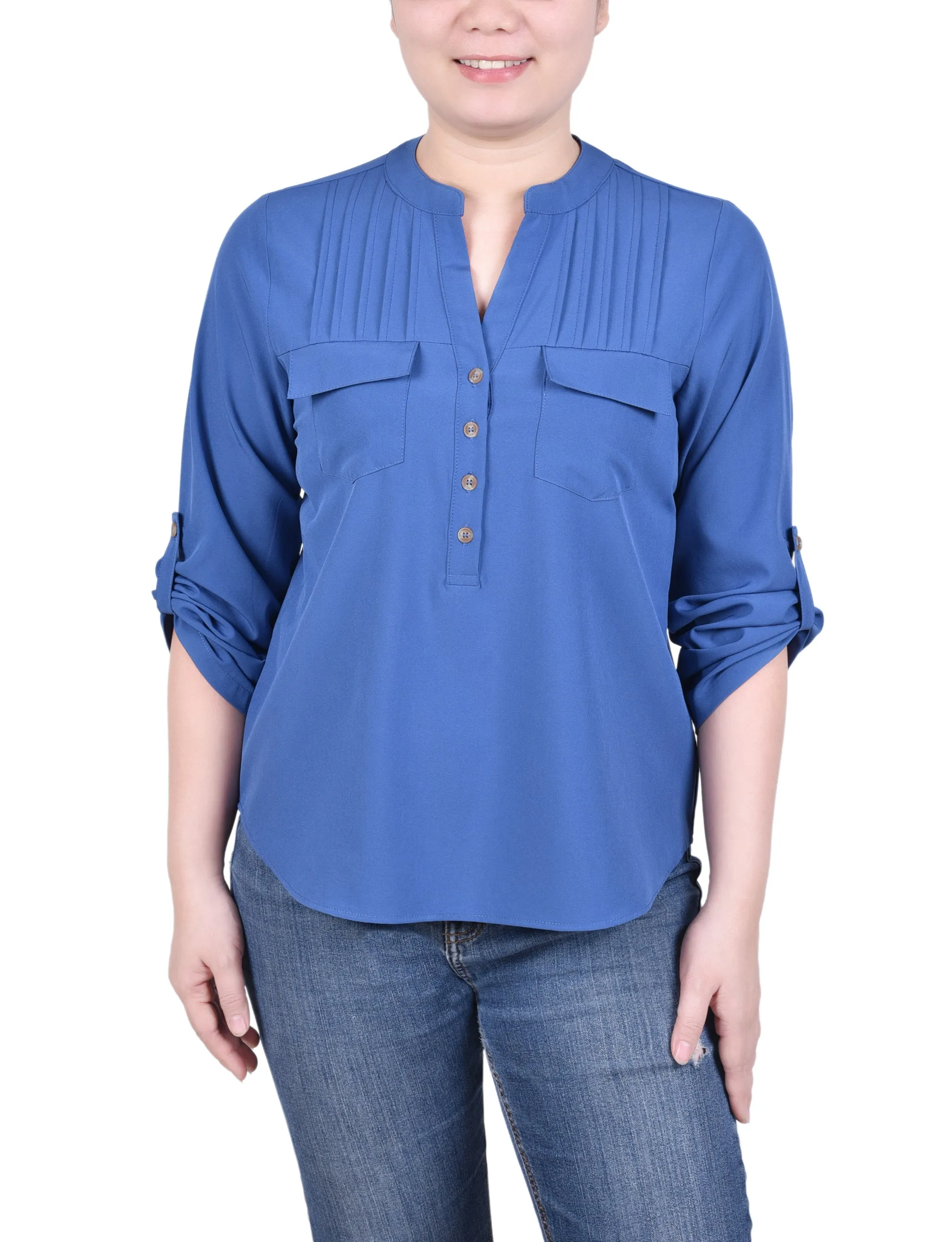 Blouse longue à manches raglan avec poches