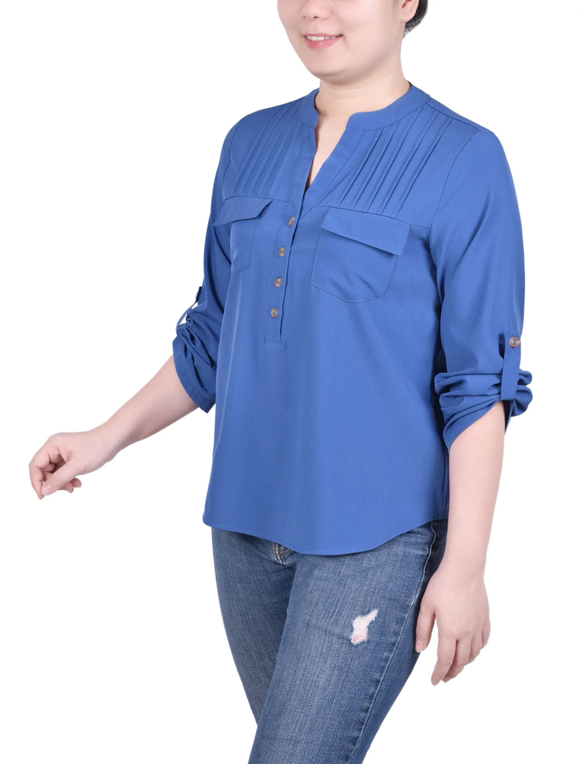 Blouse longue à manches raglan avec poches