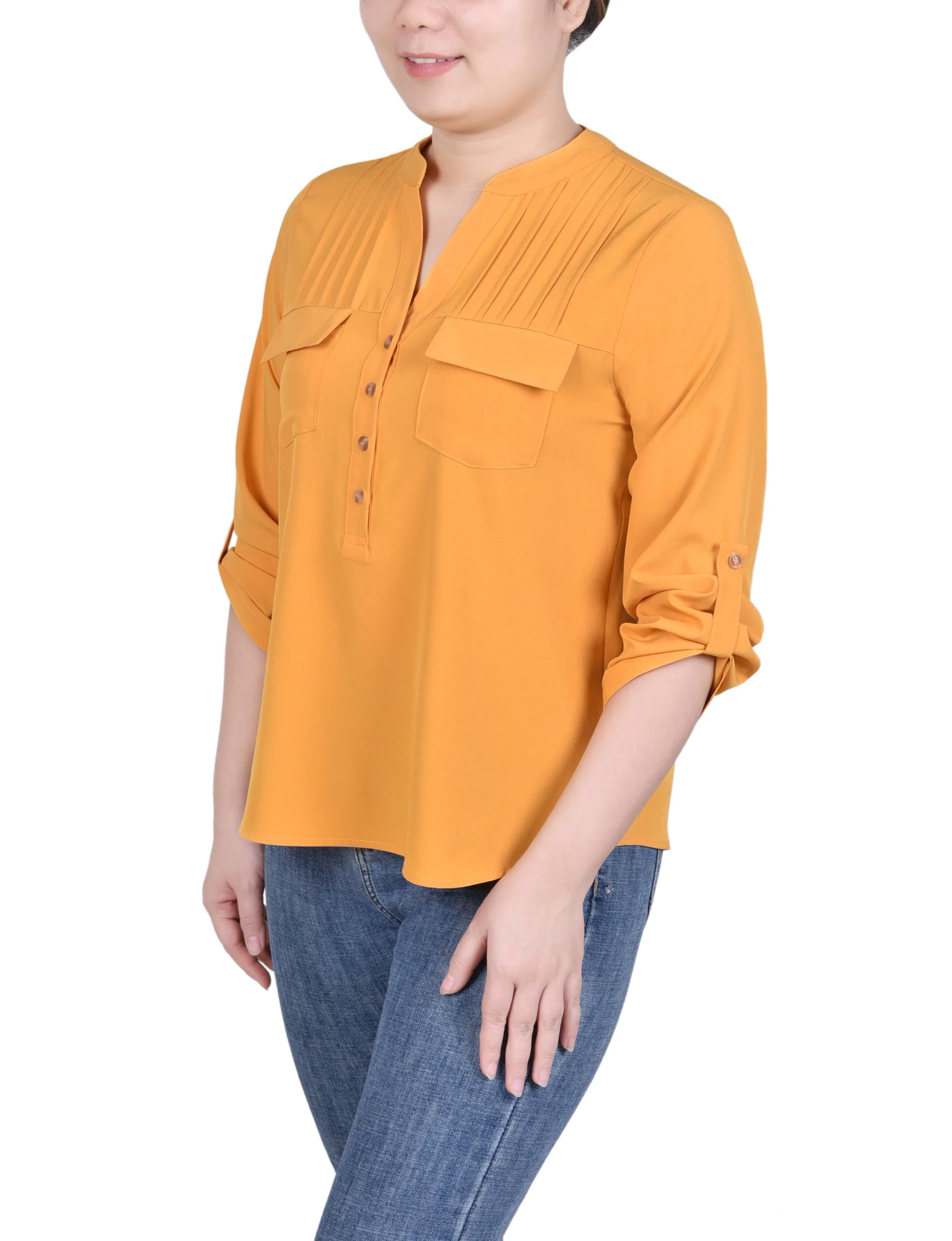 Blouse longue à manches raglan avec poches