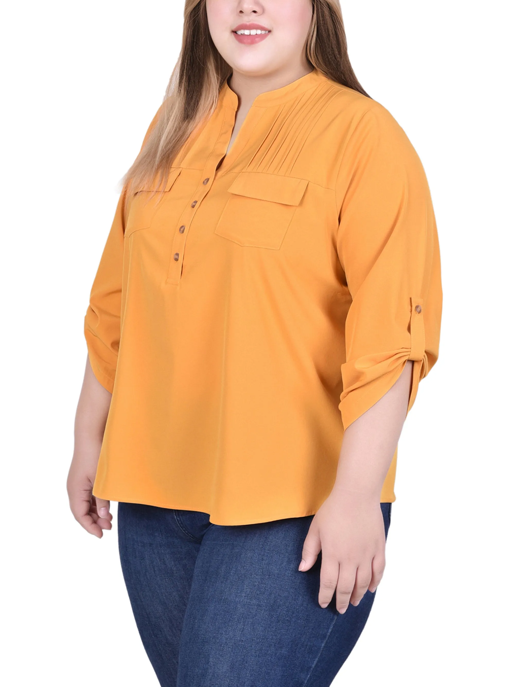 Blouse longue à manches raglan avec poches