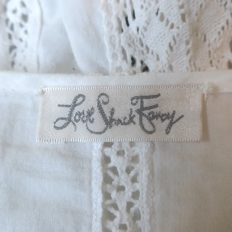 LoveShackFancy Haut à manches longues avec péplum en coton blanc garni de dentelle Taille S