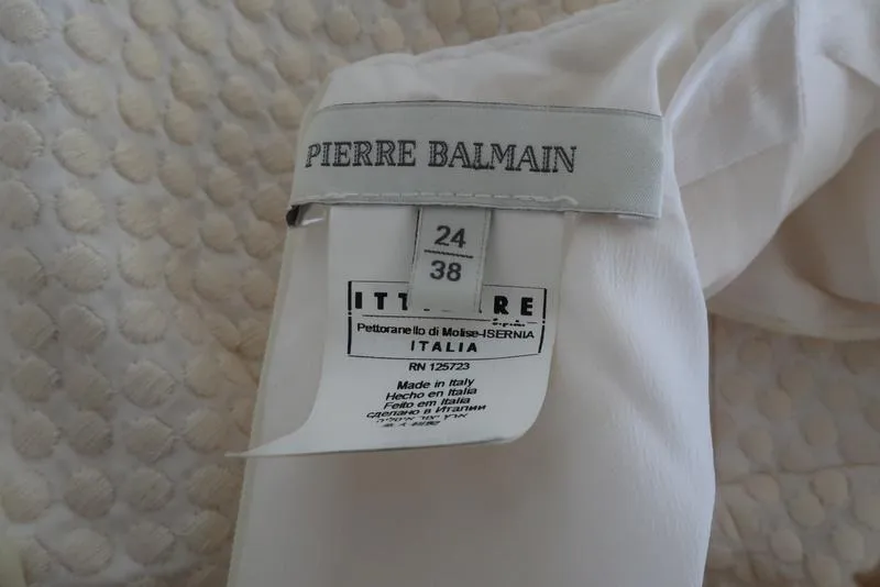 Pierre Balmain Haut sans manches péplum crème pois brodé coton taille 38