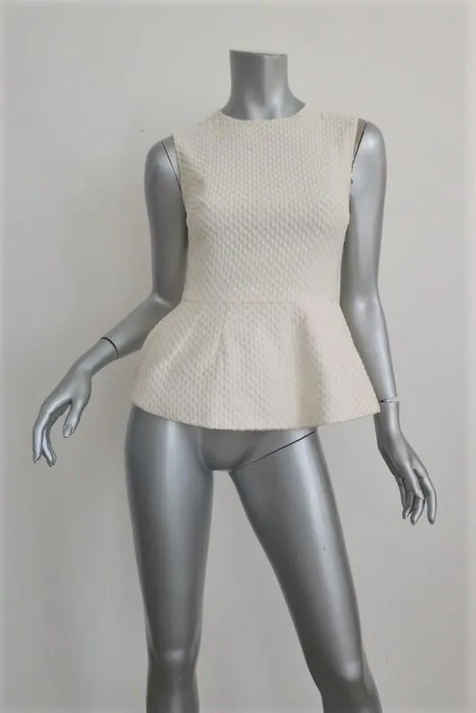 Pierre Balmain Haut sans manches péplum crème pois brodé coton taille 38