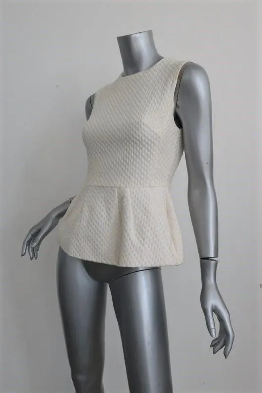 Pierre Balmain Haut sans manches péplum crème pois brodé coton taille 38