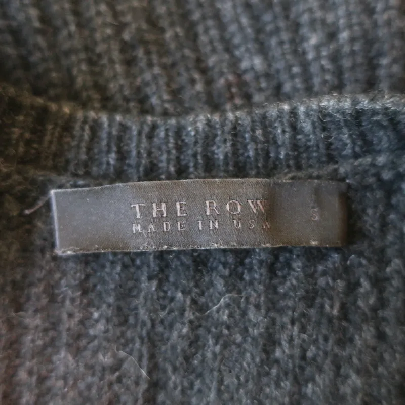 Le haut de marque The Row en cachemire à côtes, noir, taille S