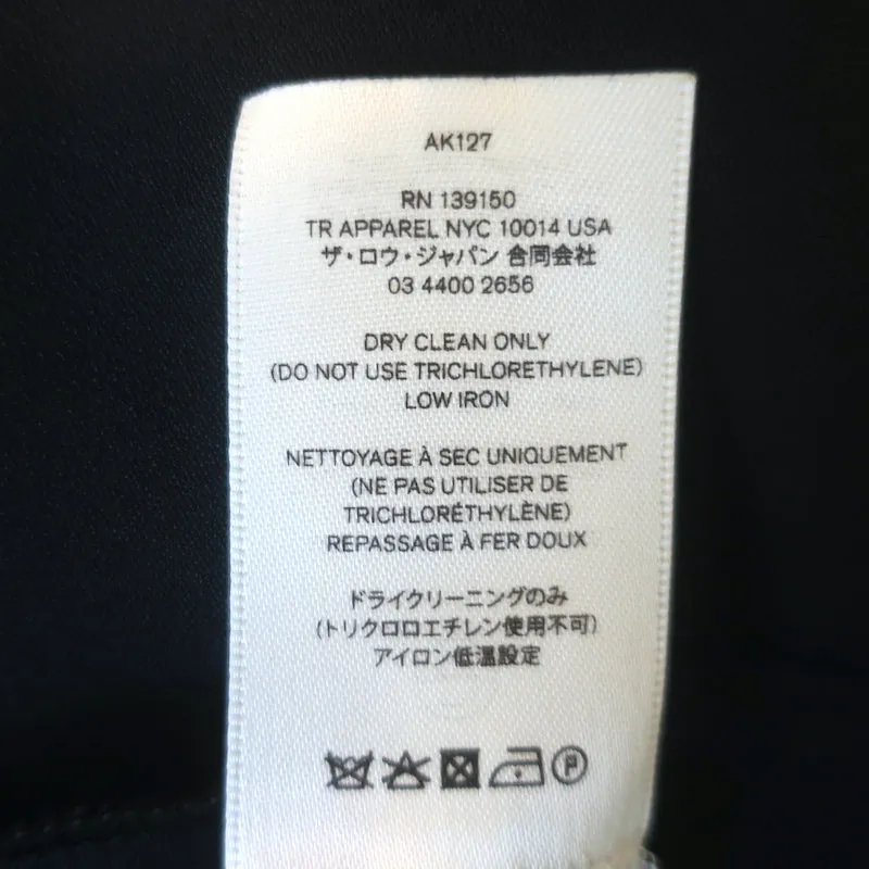 Le chemisier à col en V Row Labo Noir en crêpe extensible Taille Moyenne Manches courtes